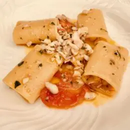Paccheri with mullet, tomato and bay leaf fillets